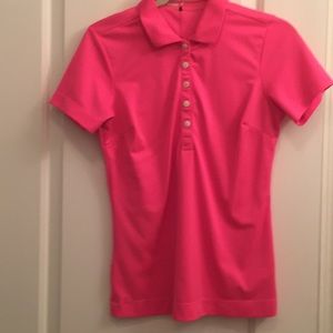 Bright pink Nike Golf shirt